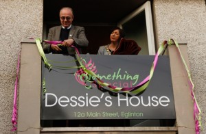 Cutting the ribbon on Dessie's House